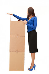 Image showing businesswoman with big boxes