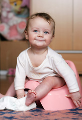 Image showing baby at his potty