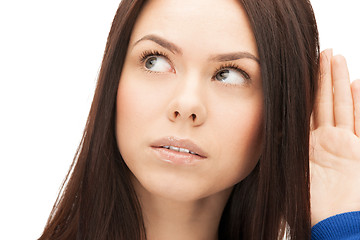 Image showing serious woman listening gossip