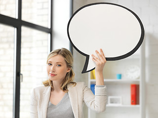 Image showing smiling businesswoman with blank text bubble