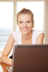 Image showing happy teenage girl with laptop computer