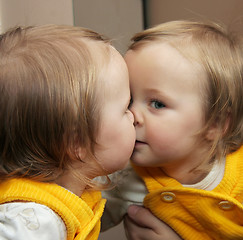 Image showing child behind mirror