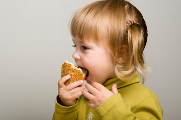 Image showing eating bread