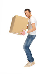 Image showing handsome man with big box