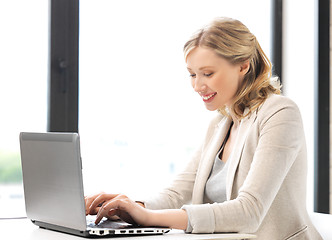 Image showing happy woman with laptop computer