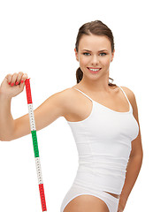 Image showing young beautiful woman with measure tape