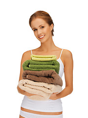 Image showing lovely woman with towels