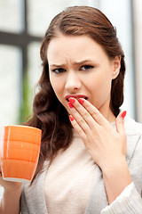 Image showing lovely businesswoman with mug