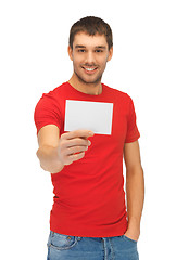 Image showing handsome man with note card