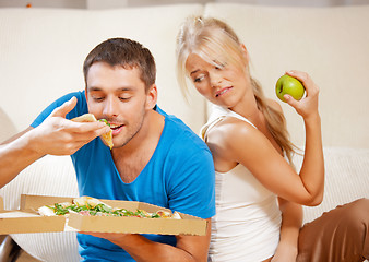 Image showing couple eating different food