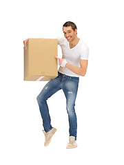 Image showing handsome man with big box