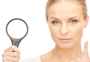 Image showing woman with magnifying glass