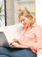 Image showing happy woman with laptop computer