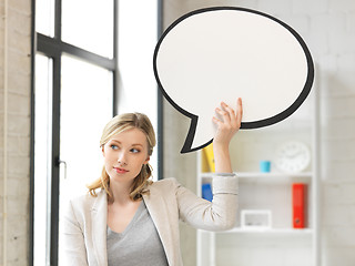 Image showing thinking businesswoman with blank text bubble