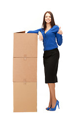 Image showing businesswoman with big boxes