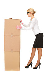 Image showing businesswoman with big boxes