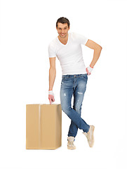 Image showing handsome man with big box