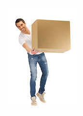 Image showing handsome man with big box