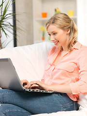 Image showing happy woman with laptop computer