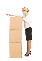 Image showing businesswoman with big boxes