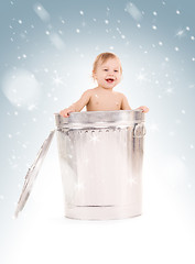 Image showing baby in trash can