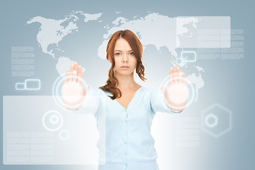 Image showing businesswoman working with touch screen