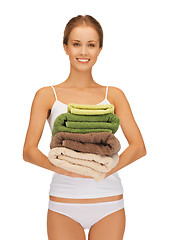 Image showing lovely woman with towels