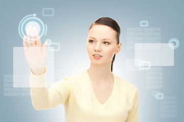 Image showing businesswoman working with touch screen