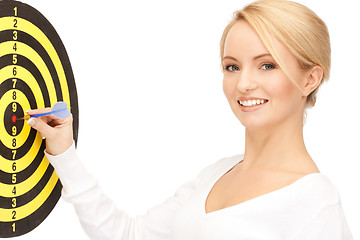 Image showing businesswoman with dart and target