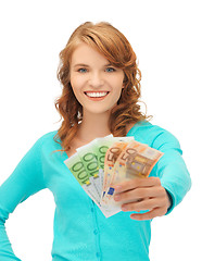 Image showing happy teenage girl with euro cash money