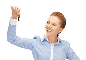 Image showing happy woman with keys