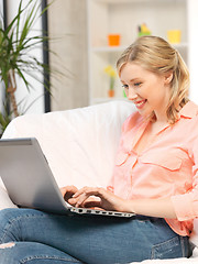 Image showing happy woman with laptop computer