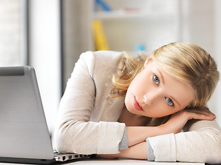 Image showing tired woman with laptop computer