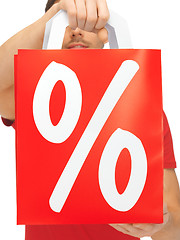 Image showing man's hands holding shopping bag