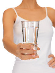 Image showing woman hands holding glass of water