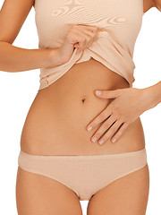 Image showing woman body in beige cotton undrewear