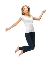 Image showing jumping teenage girl in blank white t-shirt