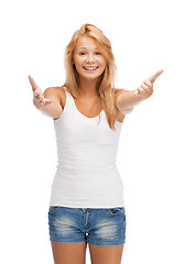 Image showing smiling teenage girl in blank white t-shirt