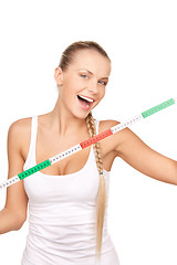 Image showing young beautiful woman with measure tape