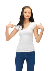 Image showing smiling teenage girl in blank white t-shirt