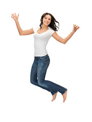 Image showing jumping woman in blank white t-shirt