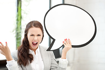 Image showing screaming businesswoman with blank text bubble