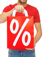 Image showing man's hands holding shopping bag