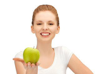 Image showing teenage girl with green apple