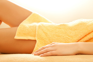 Image showing female hands and legs in spa salon