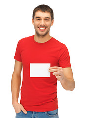 Image showing handsome man with note card