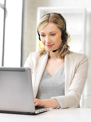 Image showing helpline operator with laptop computer