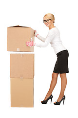 Image showing businesswoman with big boxes