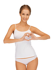 Image showing woman in cotton undrewear forming heart shape