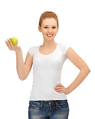 Image showing teenage girl with green apple